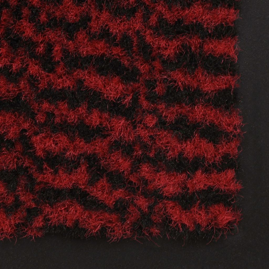 Kleur: rood Materiaal: getufte stof met een flexibele anti-slip rubberen achterkant Afmetingen: 40 x 60 cm (B x L) Totale hoogte: 5,5 mm Totaal gewicht: 1.960 g/m² Materiaal: Polypropyleen: 100%