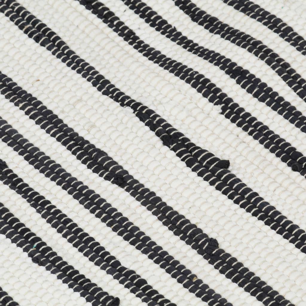 Kleur: antraciet en wit Materiaal: katoen Afmetingen: 80 x 160 cm (B x L) Met mooie, decoratieve kwastjes aan beide uiteinden Met willekeurig streeppatroon Handgemaakt Elk stuk is uniek